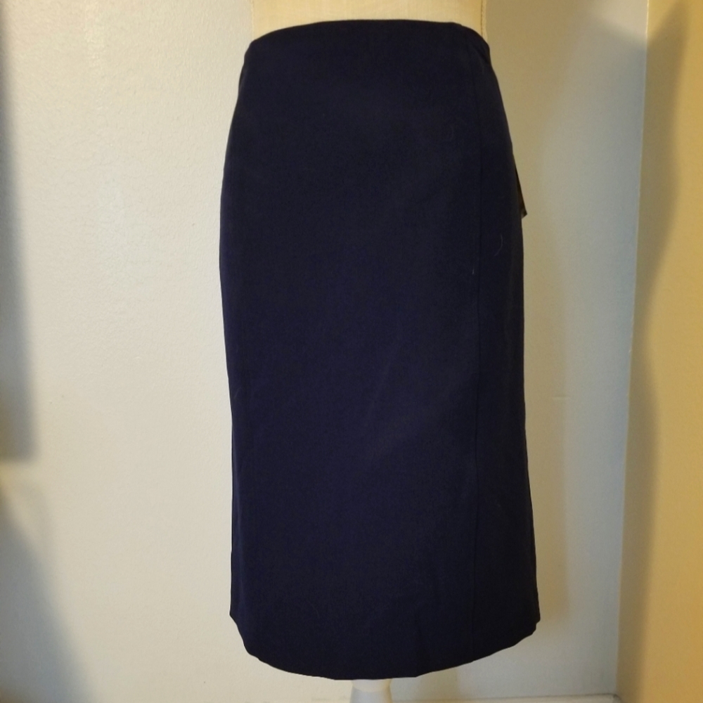 Navy Blue pencil skirt with 2 slits in the back.